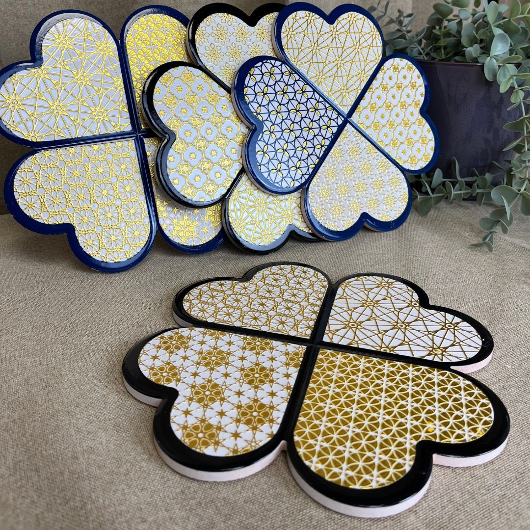 Bordskåner i keramik - firkløver 1 stk. ass. motiv